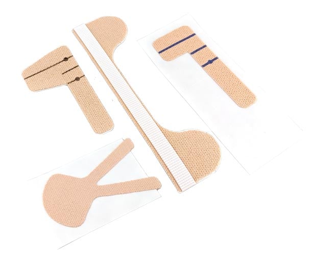 Bonding-Adhesive-Systems-2-609x508-1 four samples of adhesive medical securements converted by Boyd