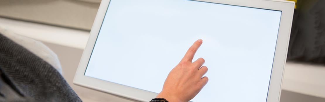 Layers of a display being cured under UV light The-Rail-Industry-and-Boyd-Solutions