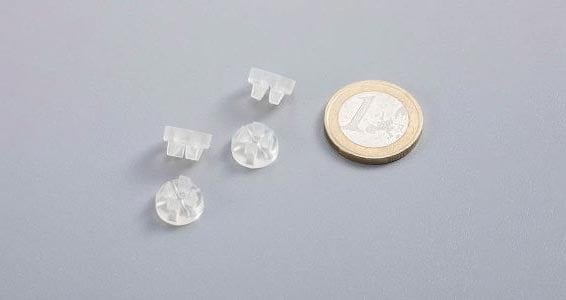 silicone formed parts with coin for size comparison